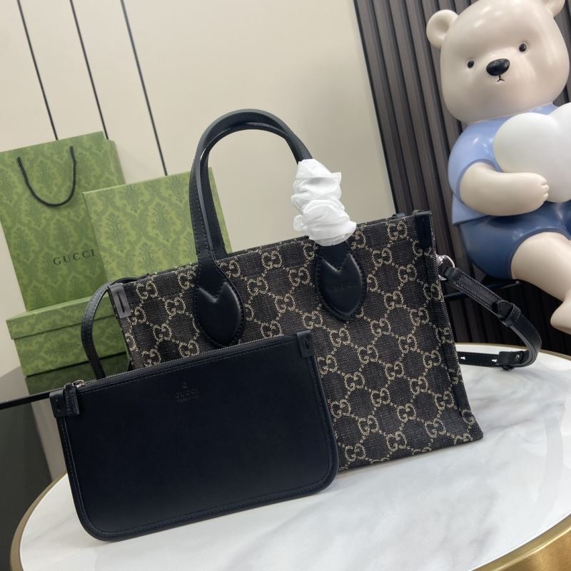 G*u*i shopping bags